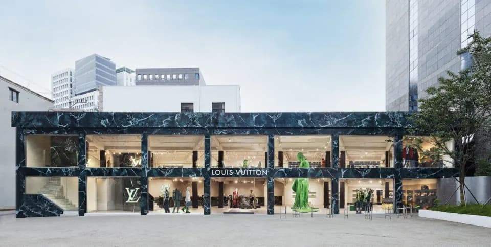 Two-storey pop-up store with a marble-patterned facade